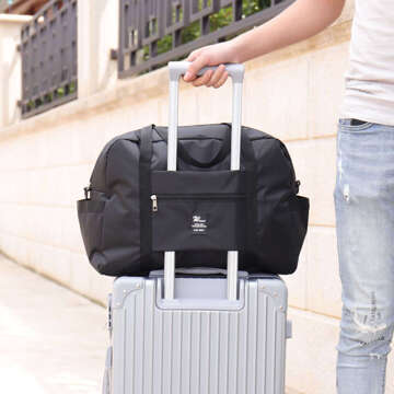 Travel bag for the plane, tourist sports cabin, hand luggage, roomy for a suitcase, holidays 36l Alogy Black